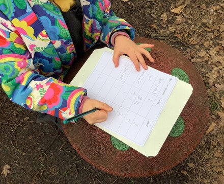 Year 2 Pupil Recording Nature Hunt Findings